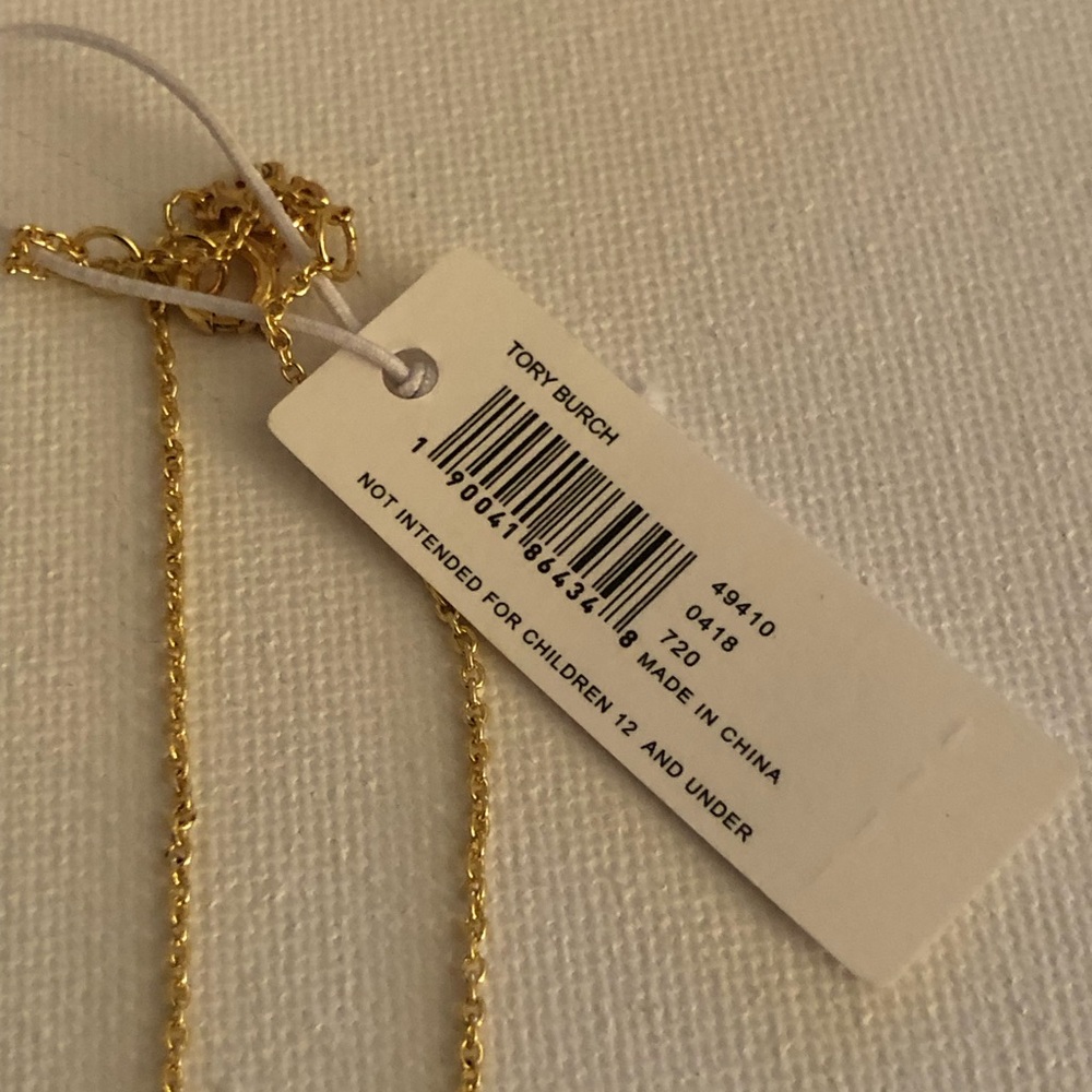 Tory Burch Gold and White Flower Charm Bracelet - Picture 6 of 6
